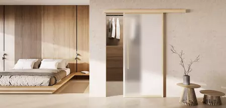 The picture shows a home picture with the mounted sliding door Planeo X in Wood.